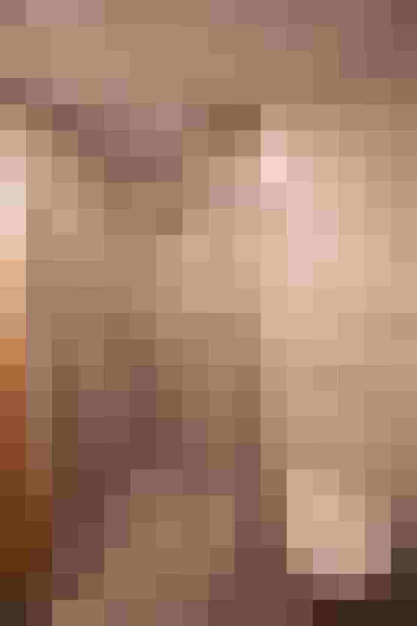 Moderne Duschkabine mit Glaswänden und WC in gemütlicher Ferienwohnung im Salzburger Land.