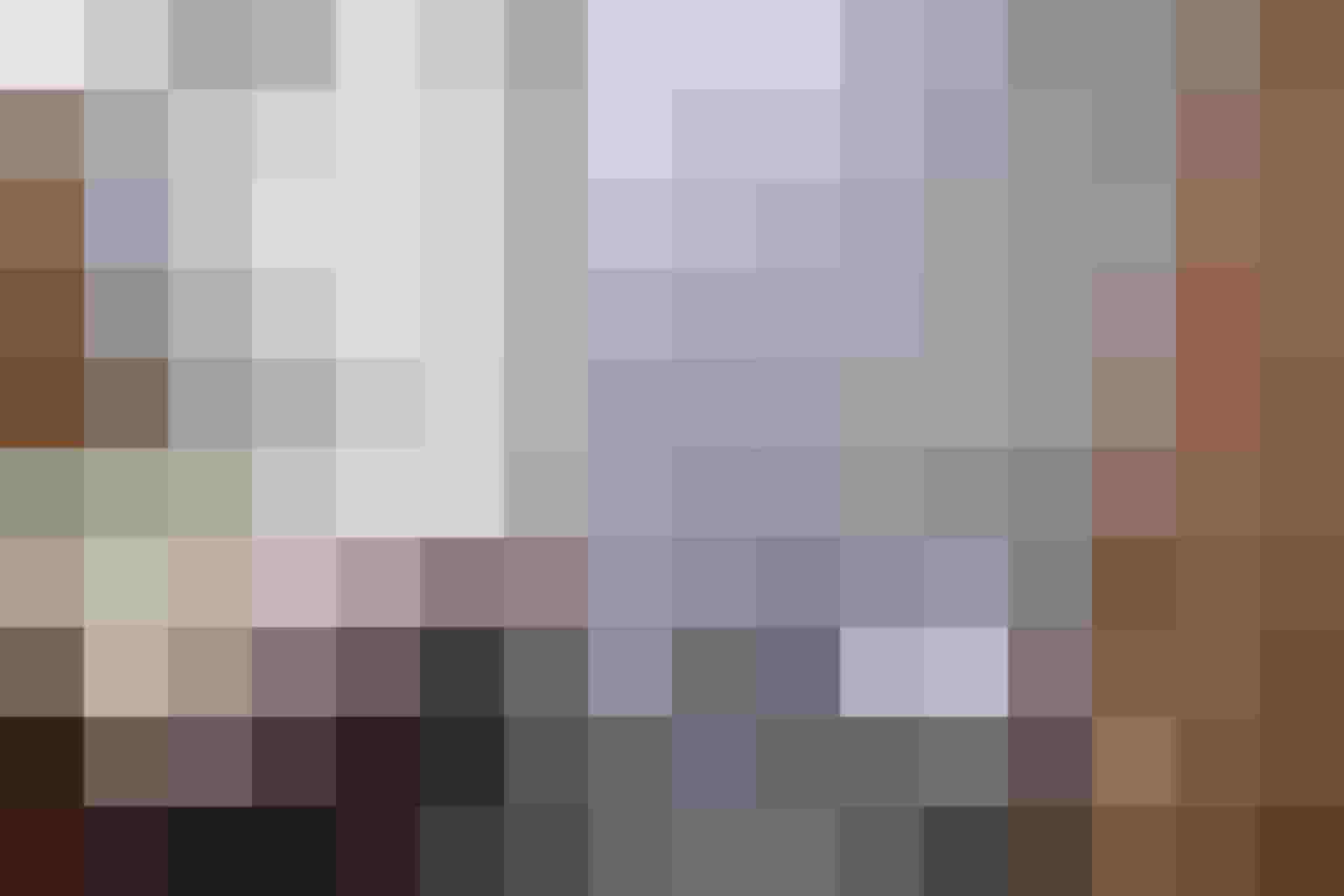 Modernes Badezimmer mit Dusche, Waschbecken und WC in den Apartments Embach.