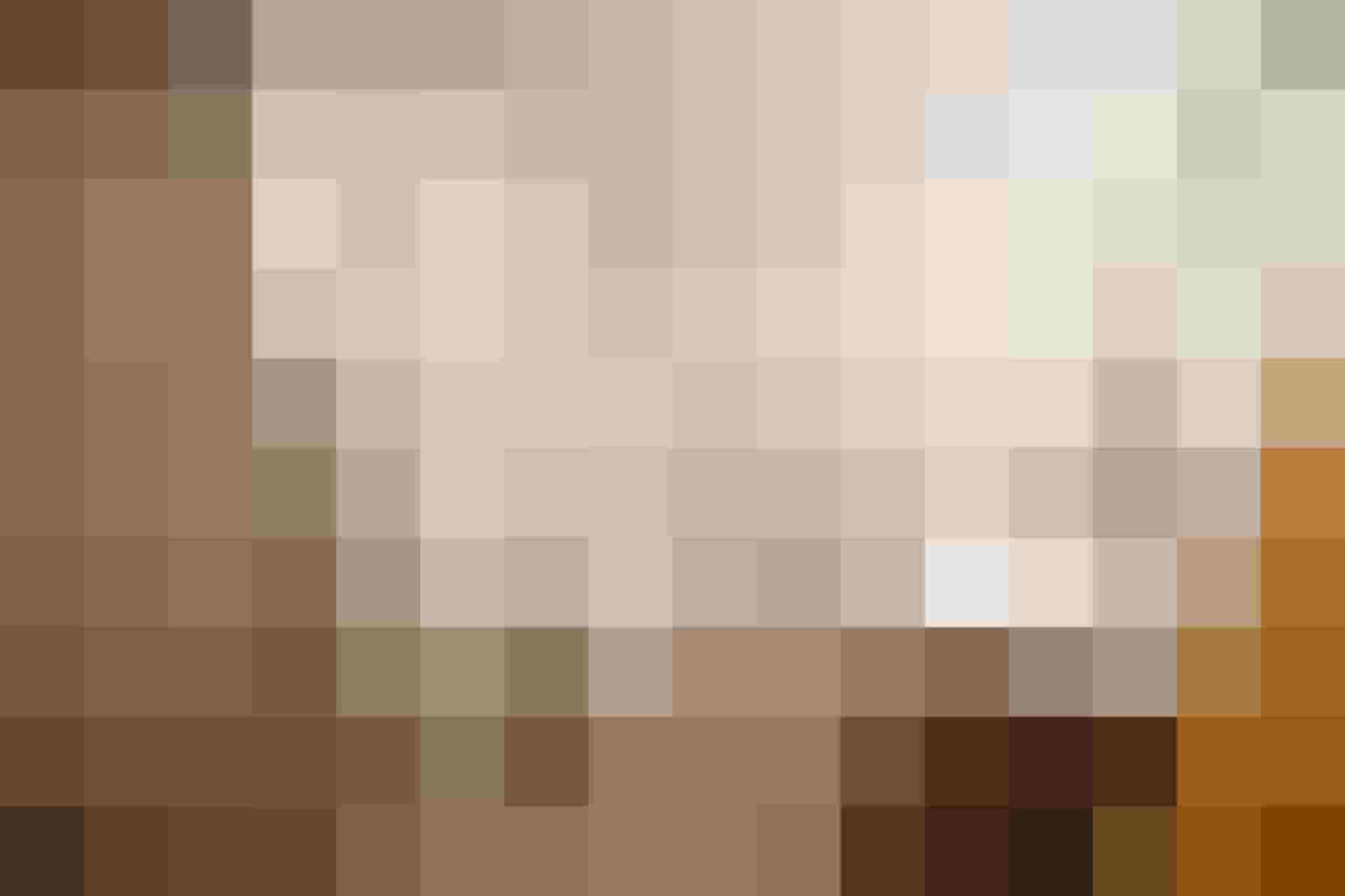 Moderne Dusche und Waschtisch in komfortablem Badezimmer der Apartments Embach.